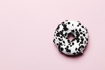 Sweet donuts on a pink background. Place for text