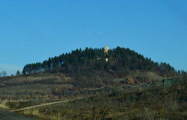 a Christian monastery at the top of a hill