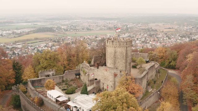 Aerial view of historic castle Alsbach in autumn Germany Darmstadt-Dieburg in 4k