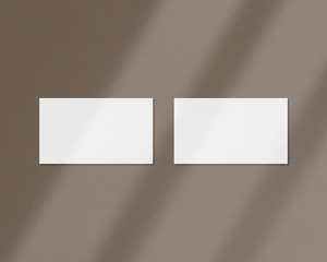 Blank white business cards mockups with shadow Overlays. Mockup scene. Photo mockup with clipping path.