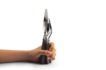 Boy holding Stainless painting palette knife with wooden handle