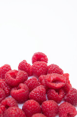 Raspberries on a white background