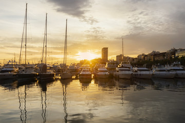 Port with boats and buildings in the background at sunset in Alicante © JavierMondejar