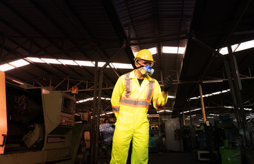 engineer working in industrial company with mechanical   receiving toxic substances.Hazardous...