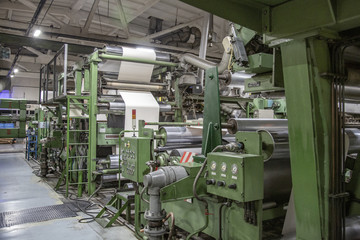 Industrial workshop of the Lambumiz plant. Production of laminated cardboard food packaging. Moscow, Russia