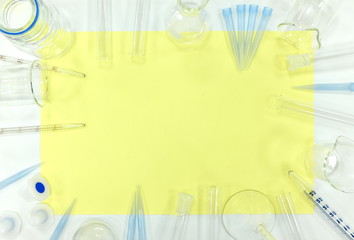 Science laboratory flat lay composition background. Beakers, Test tubes, flasks and glasswares...