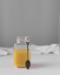 Lemon curd in a glass jar