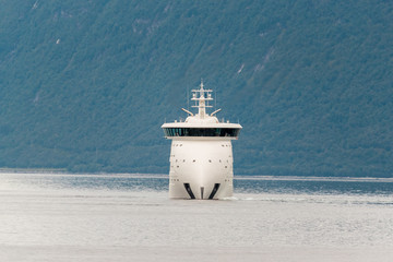 HAREID, NORWAY - 2018 AUGUST 06. Front view of the mega yacht Olivia O on her sea trail inside the fjords of Norway.
