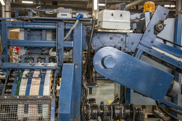 Industrial workshop of the Lambumiz plant. Production of laminated cardboard food packaging. Moscow, Russia