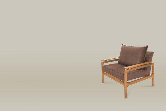 armchair. Modern designer chair on wall background