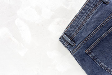 Details of blue jeans in zipper, pockets