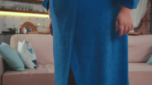 Fat woman is crying out for overweight standing on scales