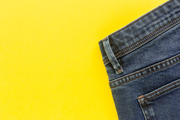 Details of blue jeans in zipper, pockets