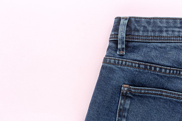 Details of blue jeans in zipper, pockets