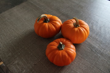 pumpkins on wooden table