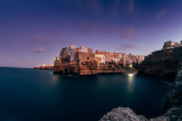 Naklejka premium Beautiful landscape at sunset in Polignano a Mare, Apulia, Italy - Puglia region.