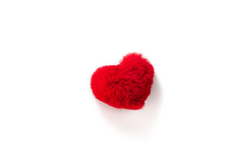 Heart. One fluffy red heart lies on a white isolated background. Valentine's day and Birthday.