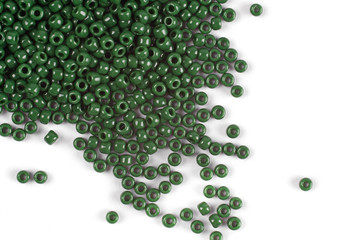 Scattering of colored beads on a white background