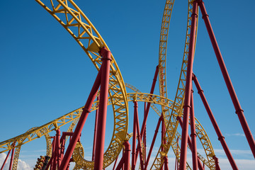 Roller coaster ride in an amusement Park. Background, postcard.
