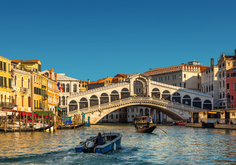 Fototapeta na wymiar The Rialto Bridge (Ponte di Rialto), the oldest of the four bridges spanning the Grand Canal in Venice, Italy.