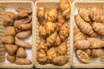 fresh buns with raisins poppy seeds and cinnamon in the mall