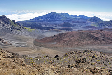 Haleakalā  or the East Maui Volcano -  a massive shield volcano  of the Hawaiian Island of Maui.