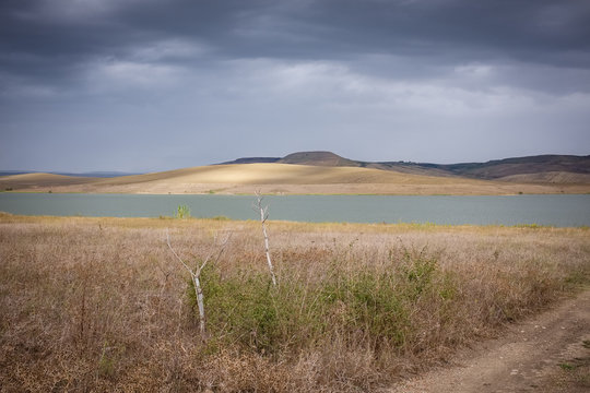 Wonderful view of artificial lake Serra del Corvo on a cloudy day . Basilicata region, Italy