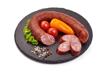 Smoked pork sausage ring, isolated on white background