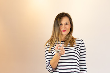 Young woman with the keys in her hand