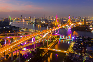Fototapeta na wymiar Aerial view of Bhumibol bridge in Bangkok district across Chao Phraya river in Thailand