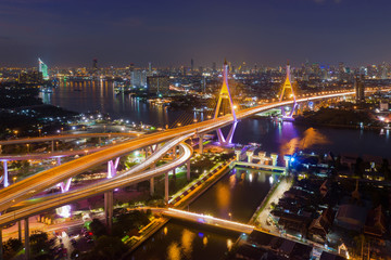 Fototapeta na wymiar Aerial view of Bhumibol bridge in Bangkok district across Chao Phraya river in Thailand