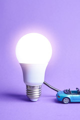 bright electric led light is on. the electric car is charging. concept. creative. copy space