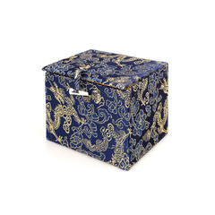 Chinese silk box with dragon pattern for a gift on a white background