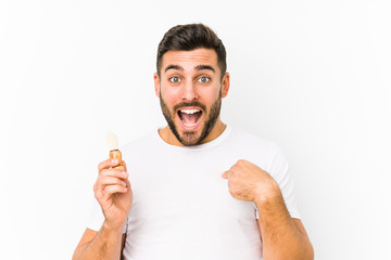 Young caucasian man recently shaving isolated surprised pointing at himself, smiling broadly.