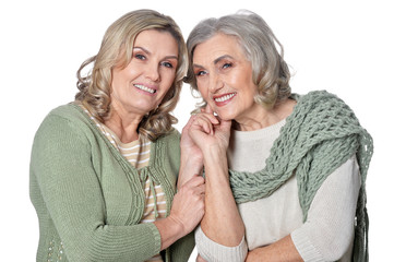 Close up portrait of two smiling women