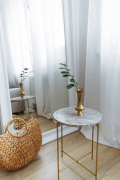 Wood Basket White Mirror And White Table White Drapes Marble Backsplash In Cozy Bright Interior Living Room 