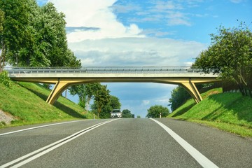 Bridge over the asphalt road in Poland as transportation concept and architecture.