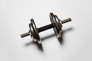 Metal Dumbbell isolated on white background.High resolution photo.Top view.