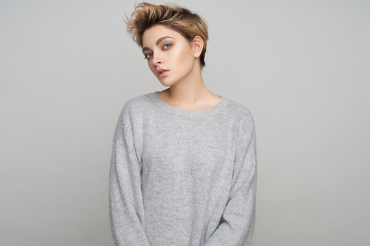 Portrait of sexy woman with short blonde hair