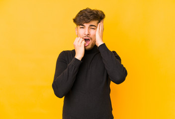 Young arabian man isolated on a yellow background whining and crying disconsolately.