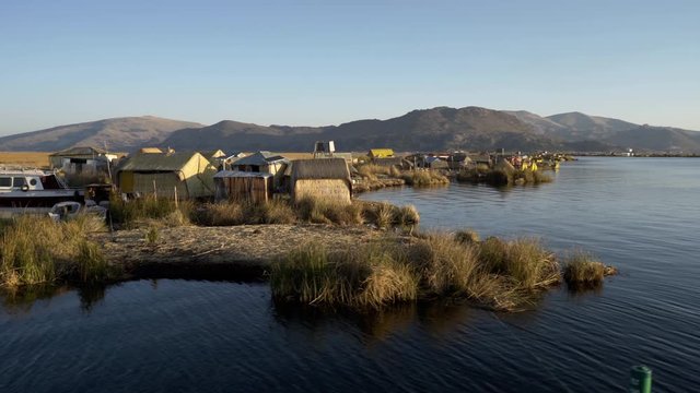 Traditional Uros floating reed islands on Lake Titicaca in the Andes Mountains at the border between Peru and Bolivia
