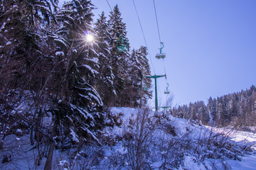  Ski cable lift in the Bohinj with sun shine