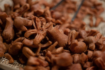 Fried sausage at street food, selective focus, 