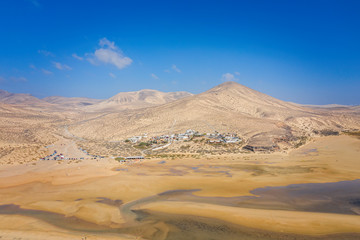 Fototapeta na wymiar This is an aerial drone shot from Canary islands. Sotavento beach is on the coast of Fuerteventura island. October 2019