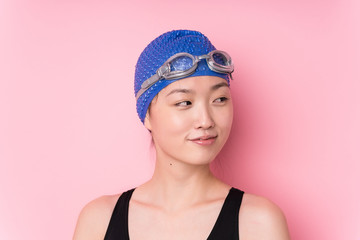 Young japanese swimmer woman face closeup isolated