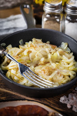 Fried onion in a cast iron skillet.