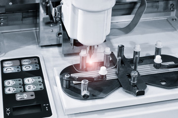 Lens manufacturing in modern laboratory.