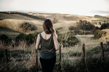 young woman in wheat field