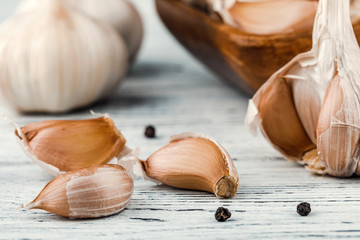 some cloves of garlic with pieces. kitchen concept