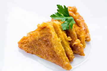 triangular pancakes on a white background